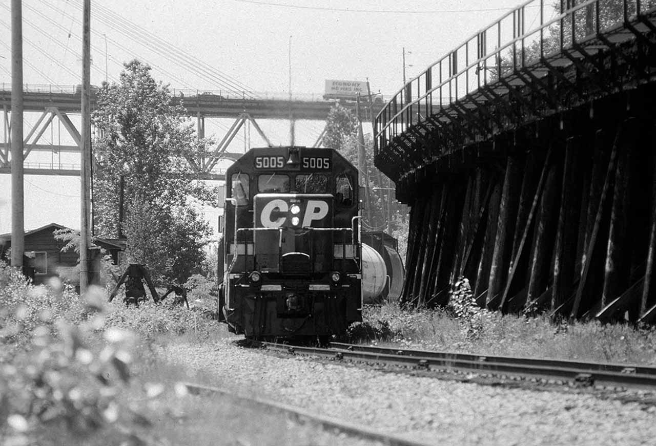 Canadian Pacific Locomotive running alongside the old wooden trstle in New Westminster making its way toward Brunette Slough