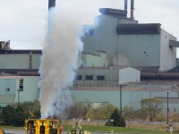 Nothing beats a good smoke show, from a 567c equipped SW900 to boot. US Steel #89 is shoving a cut of loaded coil cars back to the receiving yard - and doing their best to emulate the smokestacks from Dofasco in the background. Not often the subject of photographers, this crew was kind enough to let me know they were coming back (with a cut of empties). Thanks for the show, boyos. Hope you like the picture :) Here's hoping the Galvanizing Z line continues for years to come and a few of us get more chances to shoot this reclusive railway action.

