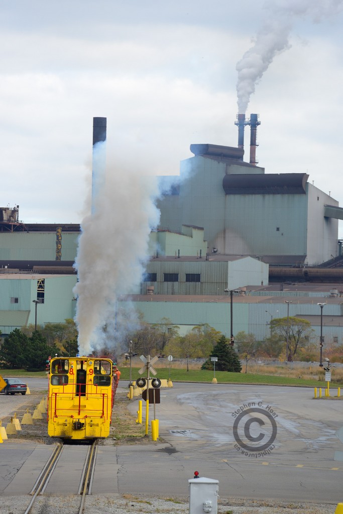 Nothing beats a good smoke show, from a 567c equipped SW900 to boot. US Steel #89 is shoving a cut of loaded coil cars back to the receiving yard - and doing their best to emulate the smokestacks from Dofasco in the background. Not often the subject of photographers, this crew was kind enough to let me know they were coming back (with a cut of empties). Thanks for the show, boyos. Hope you like the picture :) Here's hoping the Galvanizing Z line continues for years to come and a few of us get more chances to shoot this reclusive railway action.
