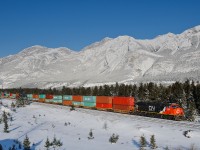 Toronto-Robert's Bank stack train Q105 creeps up to the light at English on a frigid, but clear -28C day.