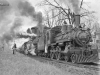 A blustery day as the Tripleheader prepares to leave Inglewood. Master Mechanic L.L. O’Brien standing in gangway behind engineer Charlie Waters while other crew members make their way back to board.<br><br>The photographer Bob Shaw was a CPR brakeman who photographed trains years ago. He retired as a conductor working out of Lambton.  His main interest was old motorcycles and automobiles. I recall seeing him ride into Lambton yard on an old Indian! Bob had two old wooden box cars in the Here Yard that were full of old car parts! Eventually, he gave them to South Simcoe Railway.  Bob is a great guy with a friendly smile! I am in touch with him from time-to-time and see him at the annual CPR pensioner’s dinner in Toronto. 