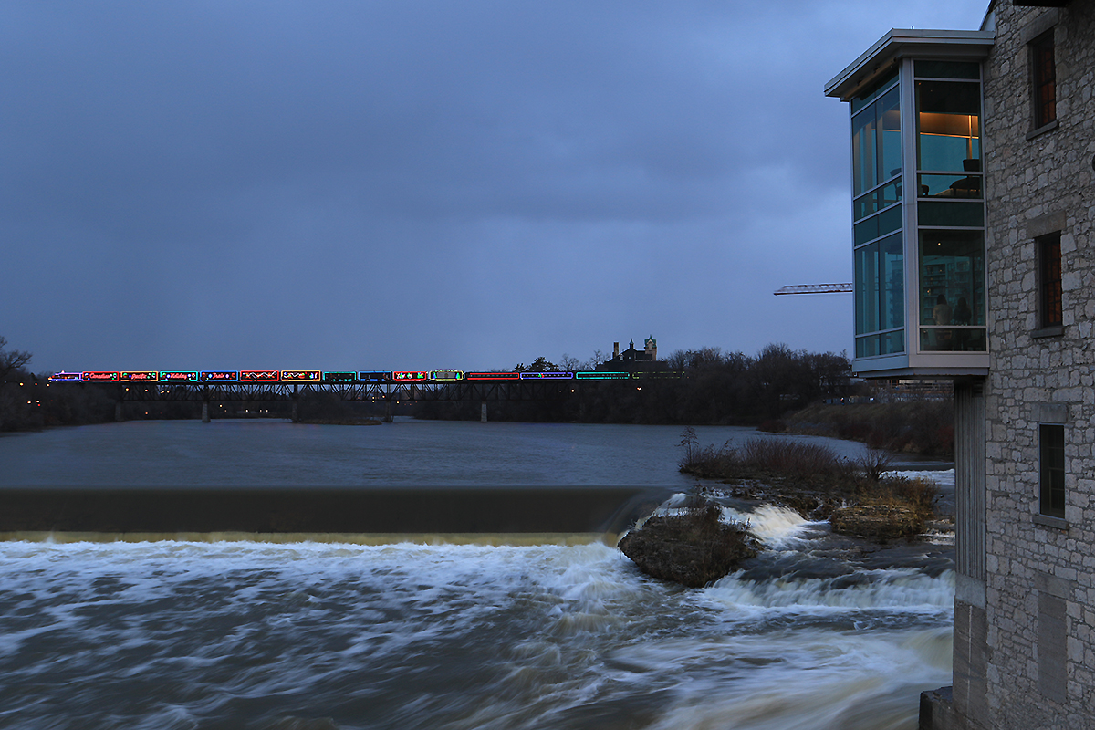 CP 01H-26 briefly stops on the bridge over the Grand River.