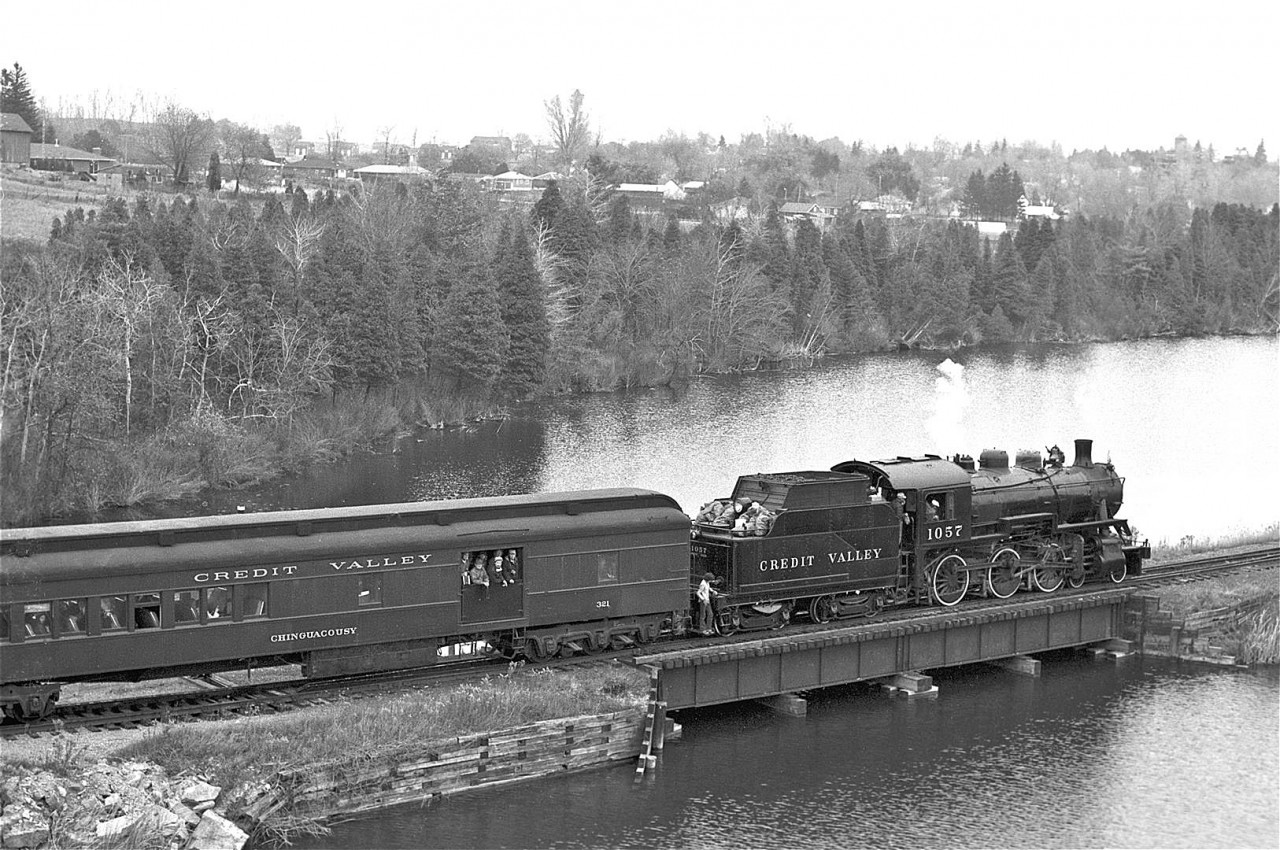 I'd like to dedicate this image to all of the wonderful volunteers involved with the Ontario Rail Association back in the 70's.  These folks (too numerous to mention by name) gave generously of their time, resources and expertise.  The result was that thousands of people were able to experience the magic of steam railroading.


1057 in the Forks of the Credit, circa 1976.