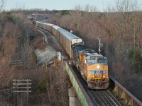 With very little light left in the afternoon, CP 147 rumbles through Woodstock with a UP ES44AC leading the way.