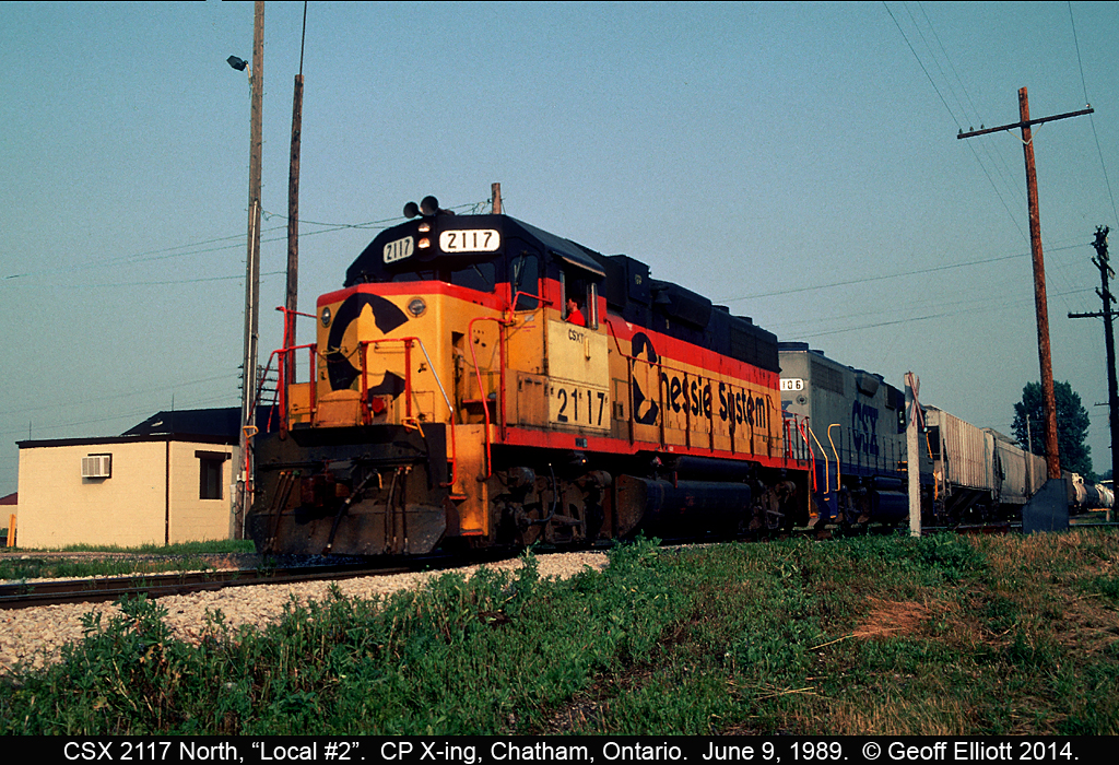 CSX 2117, former B&O 4817, leads the local back north out of Chatham, Ontario and across the CP diamond with it's cars for various refineries and industries in the Sarnia area.