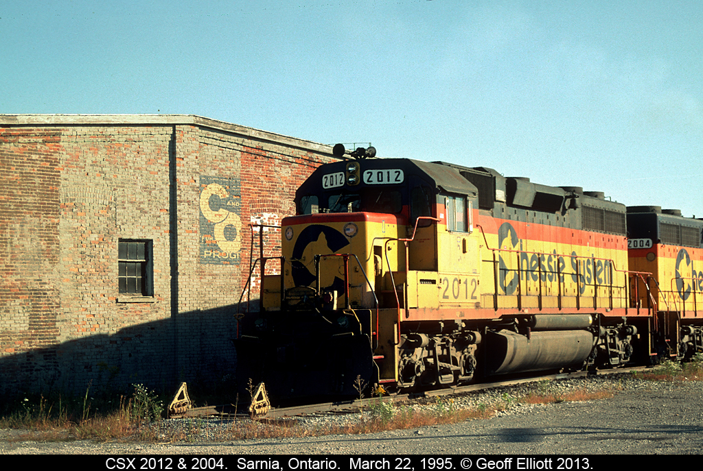 Old, New, Newest....  C&O, Chessie, and CSX all in one shot.  Here we have CSX 2012 and 2004, both still in Chessie paint, sitting along-side the old C&O enginehouse in Sarnia Ontario back in March of 1995.  Today, if you are able to get to this spot, the Chessie's are gone, but the CSX and C&O still remain.