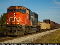 CN 5699, with train #439 in tow, scoots along VIA's Chatham Subdivision near St. Joachim, Ontario while on it's way to Windsor.  