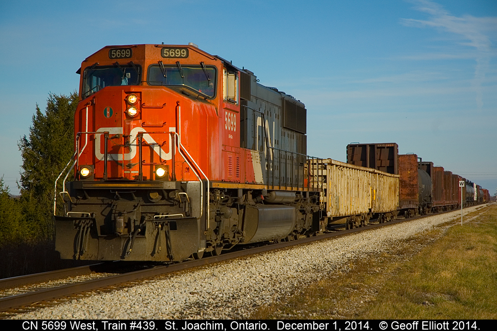 CN 5699, with train #439 in tow, scoots along VIA's Chatham Subdivision near St. Joachim, Ontario while on it's way to Windsor.