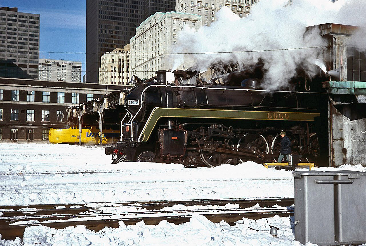 The time is 12:45 and CN/VIA Turbo 61 has arrived on Track 1, while CN Mountain 6060 is preparing to depart with a Santa Special for CN Employees and their family on a frosty Dec 10, 1977.

So very much has changed in 37 years.