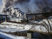 Cold days of winter brings out the glory of steam to its full extent. Proof positive is CN 6218 making its way north on the Bala Sub, with a train of railfans. Passing under the CPR, 6218 makes a beautiful sight from the shoulder of the Don Valley Parkway. Back in 1965, the DVP was quiet on a weekend, and pulling off for the occasional train picture was no problem. 