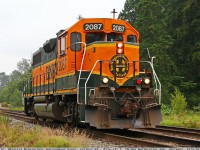 I got word from reliable sources, saying that because the Rocky Mountaineer locomotive RMRX 8018 was in at VIA getting a wheelset replaced, the BNSF 2087 will be filling the gap. The RMRX 8018 is one of the units handling the “Whistler Mountaineer”, Rocky’s day tour train travelling between North Vancouver and Whistler return. $$. 

The plan was for a Rocky crew to taxi over to the BNSF New Westminster Terminal (not far from my place), at between 1230 and 1300 Hrs to pick up the BNSF 2087 (EMD GP38-2). Then they would travel Lite Engine over to the North Shore to assume second position on the Whistler Mountaineer from Friday till Monday.
