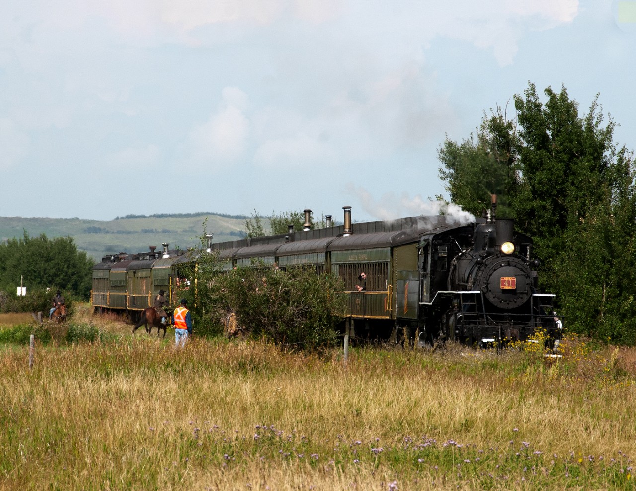 Alberta Prairie Railway Excursion regular train from Stettler AB to Big Valley with ex Mississippian 2-8-0 41 stops just north of Big Valley for a staged train robbery