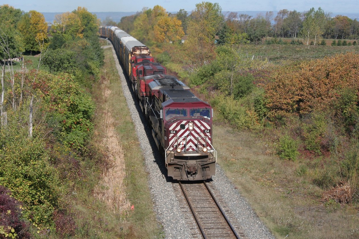 A CEFX maroon and grey SD90MAC leads, what I think is, CP 254 towards Fort Erie. The trailing units are CP 9537 and CP 8519. I wonder what became of these locomotives; many were kicking around on CP at this time, including on another train before this one on the same day with CEFX 118 and SOO 6045 (candy apple red).