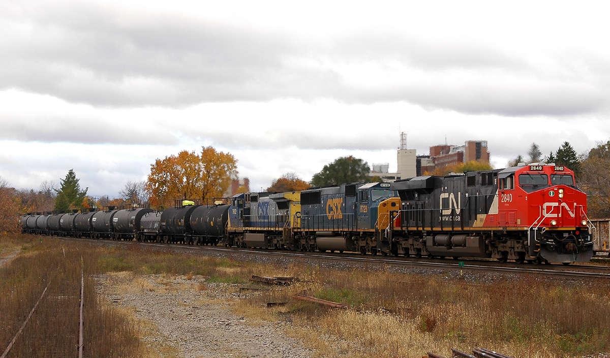332 rolls through Brantford on the first day of November with CN 2840 - CSXT 8728 - CSXT 7902 and 101 cars