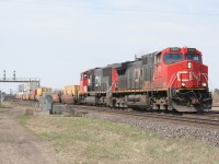 CN 2605 and an SD75i head east with containers on a sunny spring day in 2009.