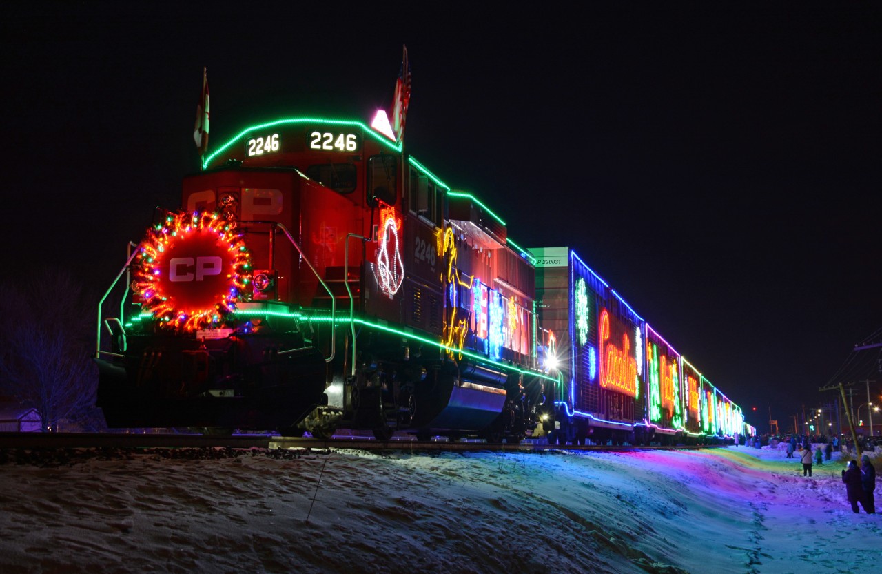 The Holiday Train stopped in Leduc this year, led by a GP20C-ECO rather than the usual AC4400CW. Remarkable numbers of people showed up; the streets surrounding the train were absolutely saturated with parked vehicles. Of course, few of the people came up to see the locomotive, rather being packed around the stage car, which would open a few minutes after this photo was taken.