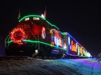 The Holiday Train stopped in Leduc this year, led by a GP20C-ECO rather than the usual AC4400CW. Remarkable numbers of people showed up; the streets surrounding the train were absolutely saturated with parked vehicles. Of course, few of the people came up to see the locomotive, rather being packed around the stage car, which would open a few minutes after this photo was taken.