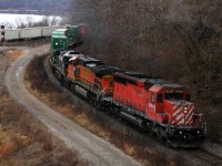 CP 142 starts up the grade to Guelph Jct with CP 6049 - BNSF 5272 - NS 8843 leading 116 cars