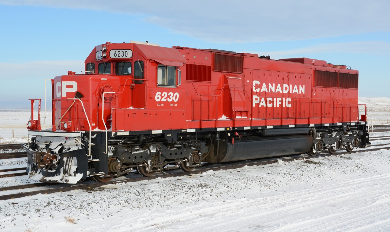 A freshly painted ex-SOO SD60 idles on a side track of the yard at Dunmore on the last day of 2013. It's quite common to find locomotives idling on this particular bit of track.