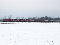 After meeting 113 at Medonte, 420 proceeds south towards Craighurst, where they'll go into the siding for 421. This 420 featured 8910-5911-5642-5994. Notable is that 5911 is one of two units left on CP's roster which still wears the large Multimark and the 5642 has no numberboards. I'm assuming it has recently been pulled from a deadline.