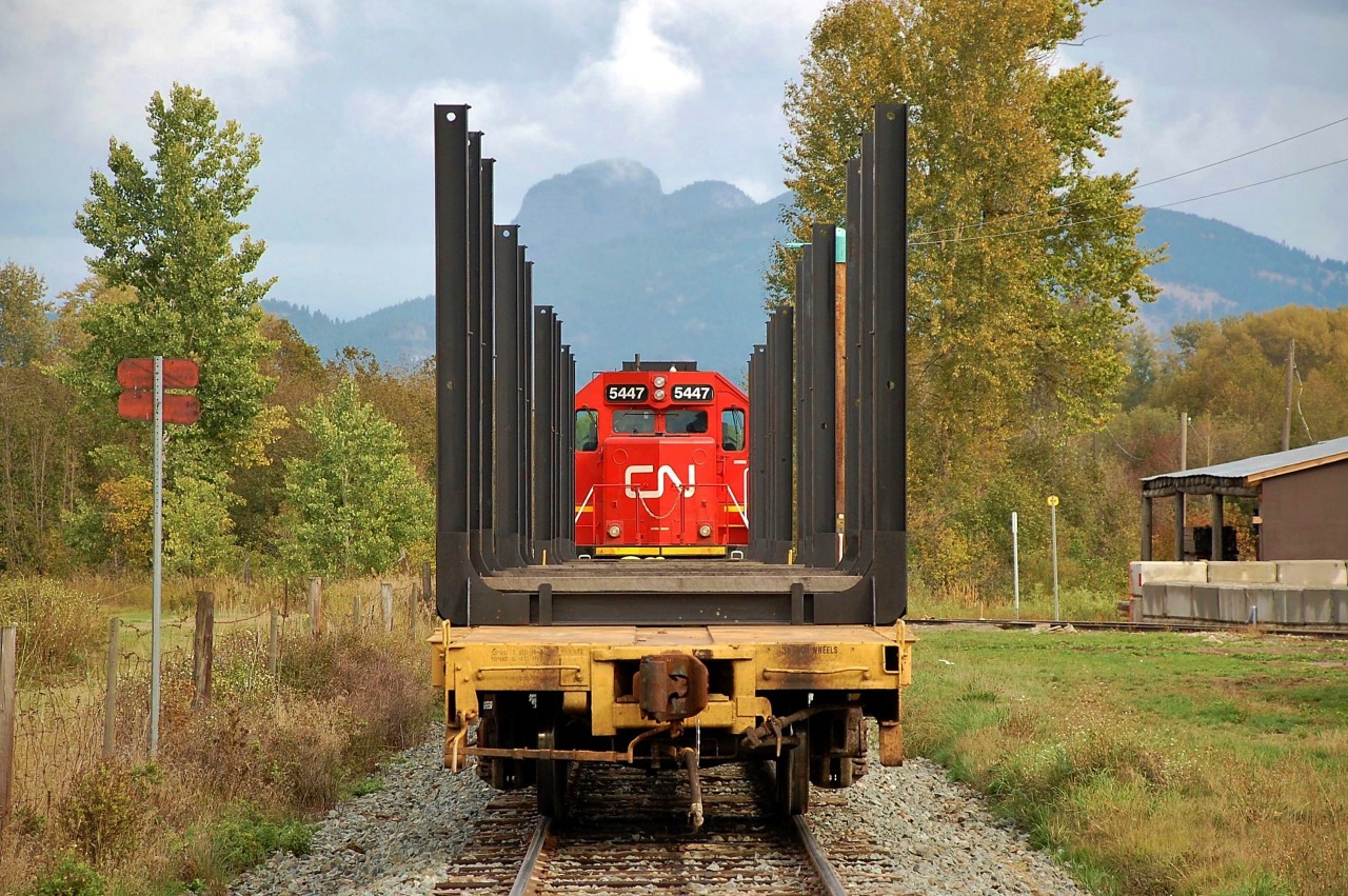 "Camels Hump" can be seen in the background as the local pick-up freight has arrived @Gorman's pole plant in Lumby.