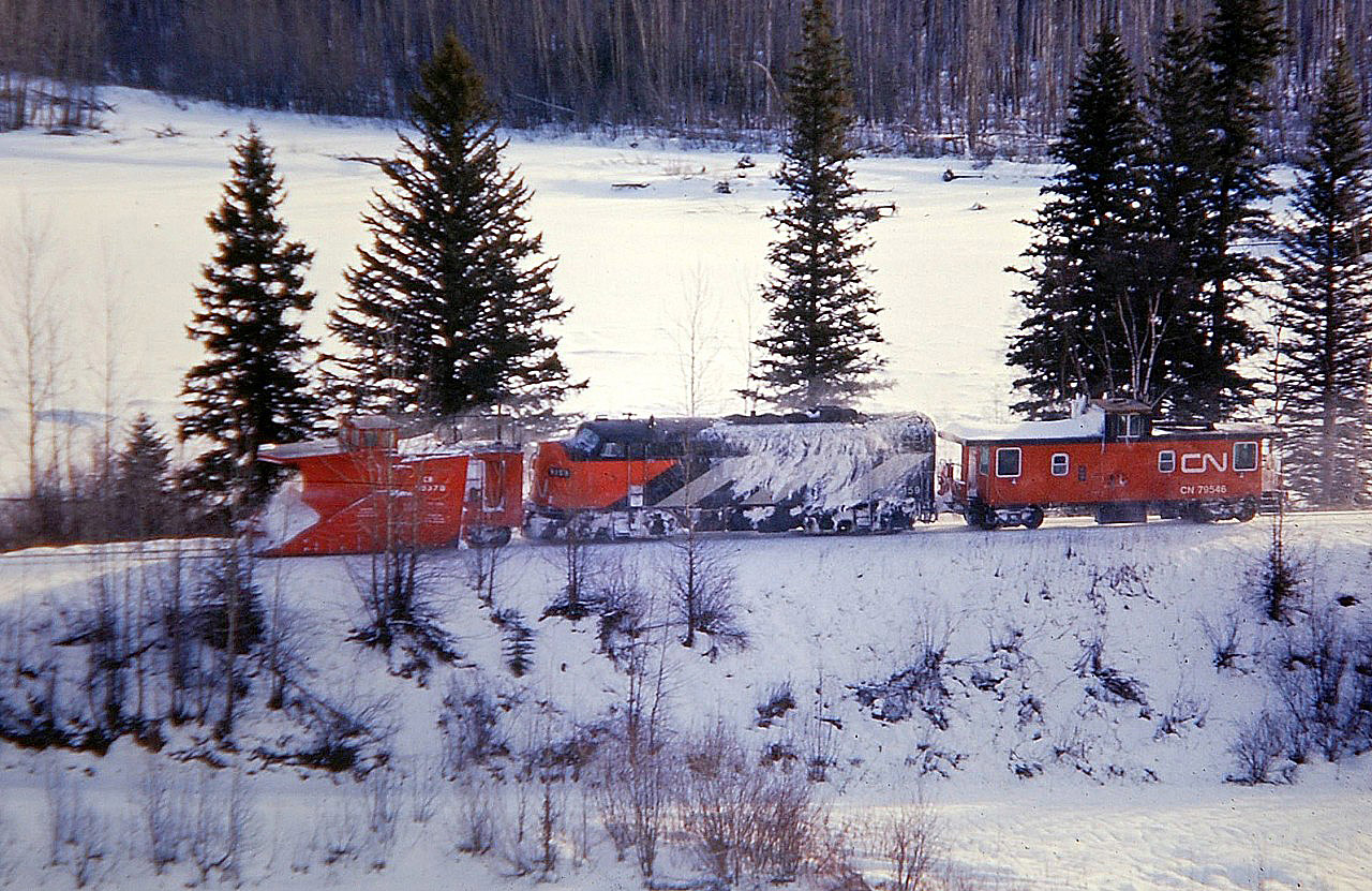 This snow plow has just passed Crescent Spur and is headed westwards towards Prince George. In the background can be seen the frozen Fraser River.