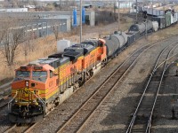 CN train 501 heads for the St. Clair River Tunnel with BNSF4374 and BNSF9148.