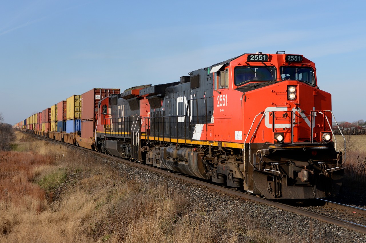 CN2551 with CN2131 lead train 148 east out of Sarnia at Fairweather Road.
