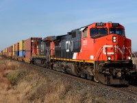 CN2551 with CN2131 lead train 148 east out of Sarnia at Fairweather Road.