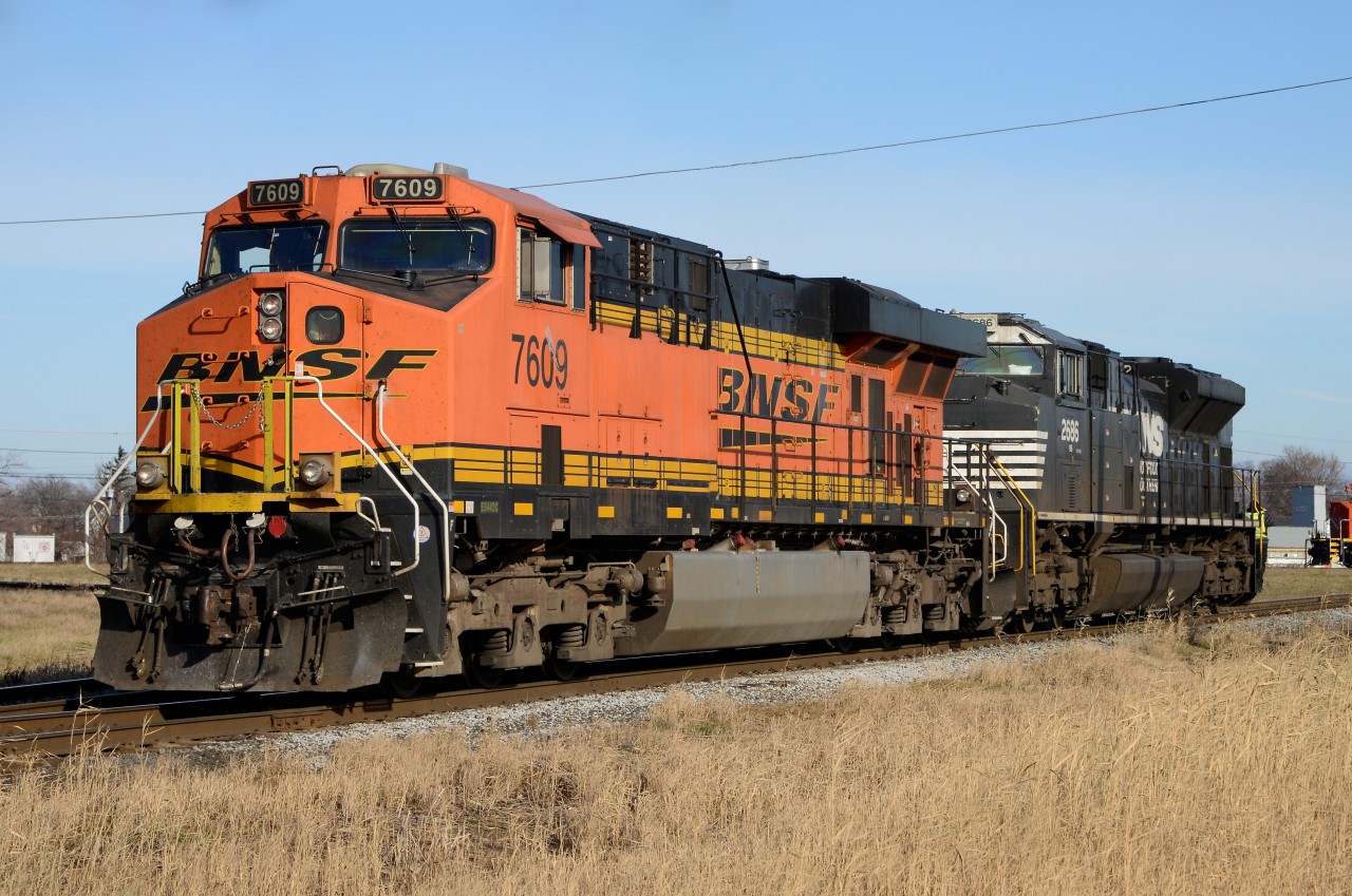 BNSF7609 with NS2686 head back into the yard at Sarnia having just been wyed at St. Andrews Street. They will lead train 501 later in the day