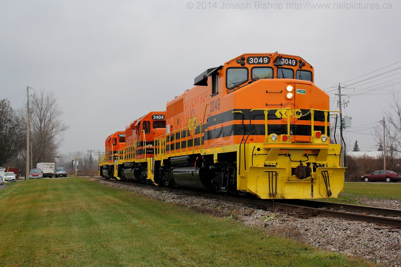 A SOR power hop throttles up through Cainsville with RLHH 3049, RLHH 3404 and RLHH 3403 as the power.  The SD40's will be used on the Nanticoke Road Switcher and 3049 will be used at the Imperial Oil facility in Nanticoke.  These new units spell the end of the GP20D's reign on the Hagersville Sub.  Thanks to James and Rob for the heads up on where the power was when I got out of class.