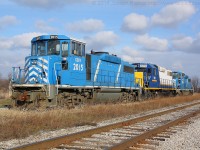 Back on May 22, Rob Smith and myself were standing on the station platform at Brantford shooting a late running SOR 597 with CEFX 2019, CEFX 2015 and RLK 4057.  The day before we had found out that the SOR would be receiving a pair of SD40-2's to replace the GP20D's.  Rob referred to his shot as "The Beginning of the end" of the GP20D's.  <br><br> My picture depicts "the end" of the GP20D's on the SOR.  On my way to Garnet to photograph the new SD40-2's I stopped by Hagersville with a hunch I would find some kind of power there.  CEFX 2015, RLK 3873 and CEFX 2006 were tied up in the yard at Hagersville.  They were waiting for a crew to come on duty to run them to Hamilton before being turned over to CN for return to CEFX.  So the end of the GP20D's has come...time to shoot some SD40-2's!