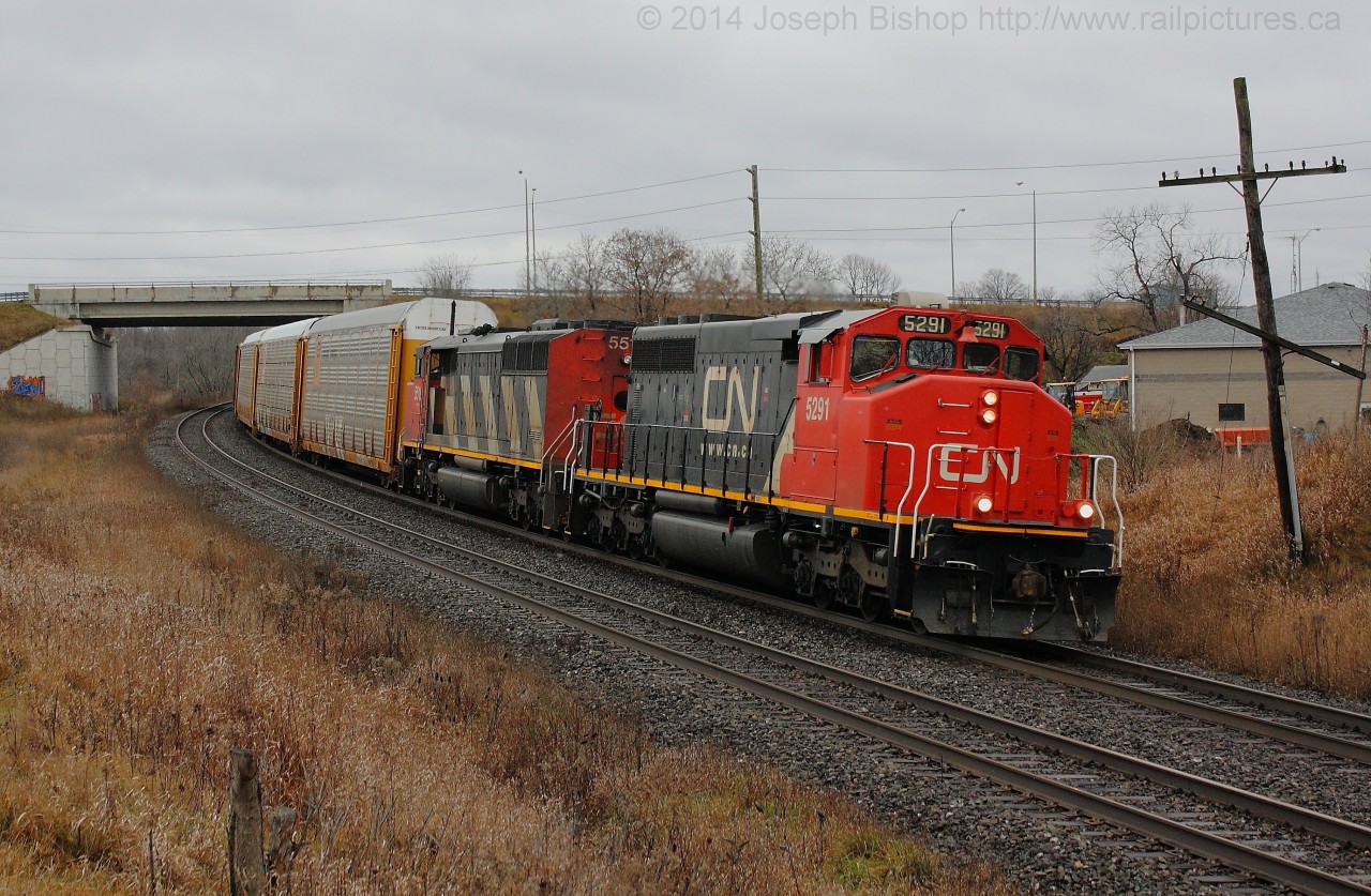 CN 5291 leads train 382 by Garden Ave on a gloomy December morning.