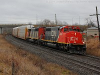 CN 5291 leads train 382 by Garden Ave on a gloomy December morning. 