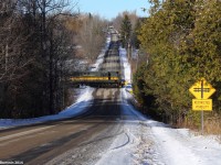 ALCO RS-11 3612 is in charge of the Santa train excursion on the York Durham Heritage Railway. In this picture, you can see them charge by Owen Rd just outside of Uxbridge. This is their last run this year until early summer 2015.