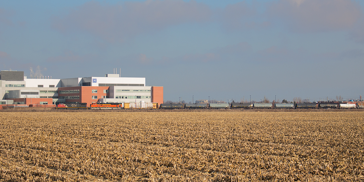 When foreign power started showing up in Ontario again, I never thought I could complain about it. Turns out I got somewhat sick of seeing GE's from any class 1 railroad somewhat quickly (especially BNSF), unless they were in an older paint scheme. Aware CN 331 was offering a view of a BNSF "EMD", I wasted to time getting up to see it. Here, it passes in front of the relatively new St. Catharines Hospital with CN 2196 and BNSF 8780 for power. This is the second day in a row 331 has had an FPON, somewhat rivaling yesterday's lashup.
