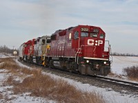 GP 38-2's CP 3122, 3084 in tuscan and grey heritage paint and GP20C-ECO 2232 head south from Lacombe towards Red Deer.