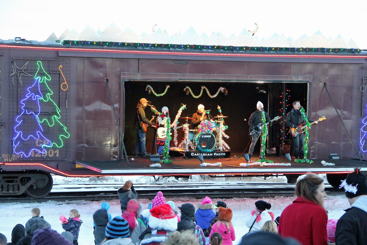 AT the Ponoka stop of the Holiday train the band "Odds and Roxanne Potvin" perform for a good size crowd​