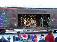 AT the Ponoka stop of the Holiday train the band "Odds and Roxanne Potvin" perform for a good size crowd​