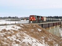 CN SD75I's 5771 and 5735 cross the North Saskatchewan River with a southbound on CN's Vegreville Sub.