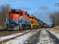 A former CP GP35 RLK2211 is leading train 431 at Guelph, Ontario. A GP35 leading two SD40-2's and one SD45T-2 in 2014? Only on a Shortline! Just behind me is train 516 in the clear on the Guelph N Spur lead (Furthest track in background at lower left), XW12 - which I managed to find 4 hours later heading back west. The sun had just come out as 431 approached - a very welcome sight indeed. <a href="http://www.railpictures.ca/?attachment_id=17343">click here for a photo of 516</a>