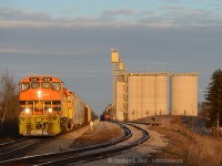 GEXR 516 is passing the Parrish and Heimbecker Shantz Station Terminal grain elevator which was built in 2003. 516 came from Stratford to work Traxxside at Guelph, following which they lifted a cut of cars from XW20 and tied up in Kitchener.