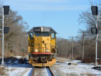 CTC is coming - as evidenced by these signals for the "West Guelph Junction" switch. This area was (and still is) known as (CN) Guelph Junction as a station was located 1/2 mile east of here for the crossing of the Great Western and Grand Trunk railways. The station survived well into the 1970's as an operator would have likely been stationed for the Fergus sub. What Metrolinx will call this new control point is anyone's guess - but I'm hoping Guelph Junction :) .  At the time of this writing this is the newest and most eastward signal on the Guelph sub yet installed.<br><br>Operation wise: This is GEXR 582 - now based out of Preston (instead of Kitchener). Engine parks at Eagle St in Preston, runs from Preston to Guelph, sets off empties at the east switch 'Guelph Junction', wyes the engine along Crimea St, and runs to the west switch (pictured here). After lifting cars, train will back along the main (pictured) to the Fergus spur switch for the return to the Galt/Preston area. This seems to occur around Lunchtime.