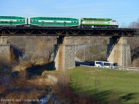 Photoshop? Nope. This is real! GO 607 is doubling as the "Holiday Engine" for GO Transit/Metrolinx this season. Seen here heading east on GO #718. Thanks to David Vincent For the heads up!
