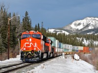 Capreol-VIT X111 speeds around the curve at Swan Landing East behind a pair of brand new GE ES44ACs on their first trip west. 