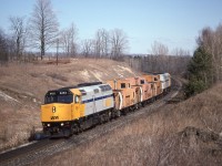 During a strike of CP,s mechanical staff and to avoid picket line delays, replacement workers were shuttled between Oshawa and Agincourt with two Via FP40PH,s and three CP vans. The WB movement shown at Ajax ( Audley ) 