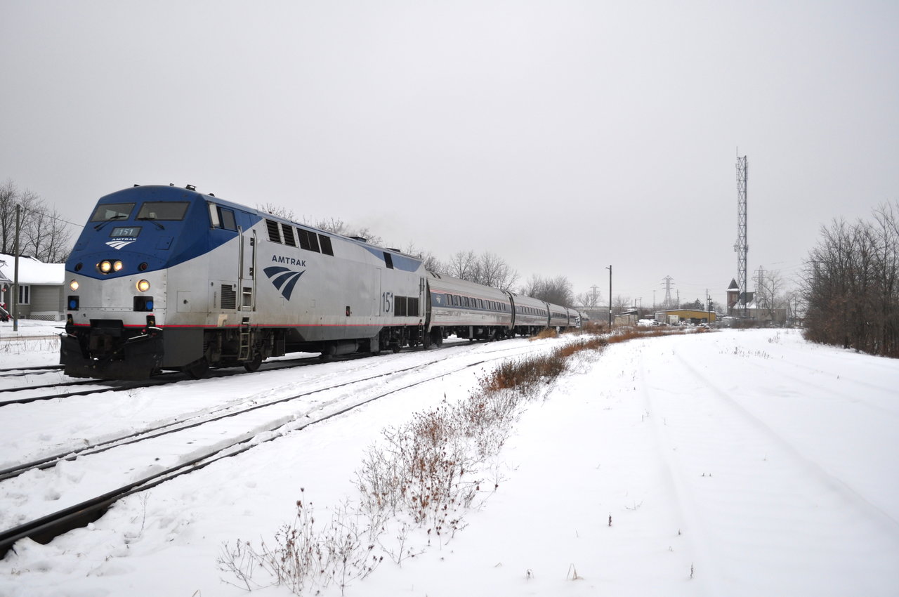 As I was waiting for the CN 331 that never showed up, The Maple Leaf darts through the Merriton junction. I'm standing in the rarely used , snow covered Merriton yard. The un snowy track closest to me is the Trillium Grantham Spur. The last time this yard was full was in 2012 when CP was on strike, and Trillium needed a place to store the cars that would have been shipped off on CP trains.