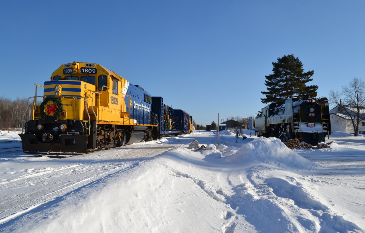 Old and the new
TN&O 701 sits at its home in Englehart while the christmas train awaits its nightly duty