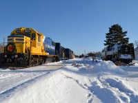Old and the newTN&O 701 sits at its home in Englehart while the christmas train awaits its nightly duty