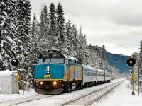VIA Rail Canada's (Jasper) Santa train accelerates westward on CN's Albreda Sub. Using the equipment from the Skeena and an additional two coaches, a volunteer VIA Rail crew will operate this train twice today, taking it from Jasper to Yellowhead (17.5 miles west of Jasper) and then reversing back to Jasper. Santa meets the train and its young passengers at Yellowhead.